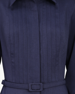 Close-up of the five pintucks either side of the concealed placket on the Mathilde midnight navy shirt-dress